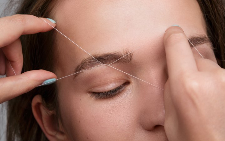Threading to remove hair