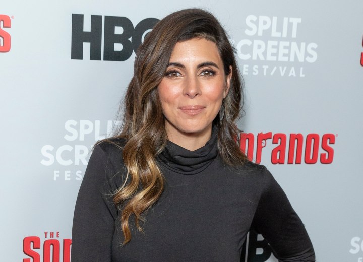 Jamie-Lynn Sigler wearing a black turtleneck