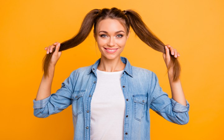 Hair styled in pig tails