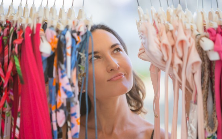 Woman who is shopping for new swimsuits